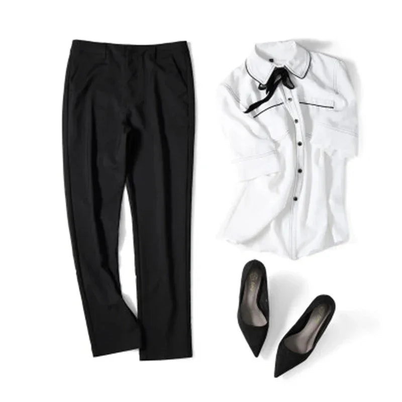 Pantalones rectos de algodón elástico de cintura ajustada