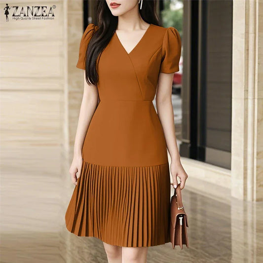 Elegante vestido plisado con escote en V y mangas abullonadas