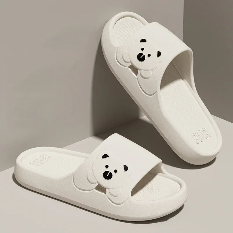White bear-themed slide sandals from danastors, trendy fine fashion footwear.