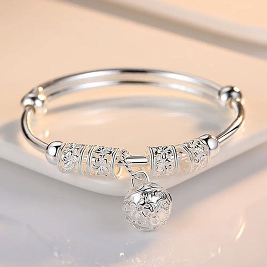DANA Silver Hollow Bells Ball Bangles Bracelets