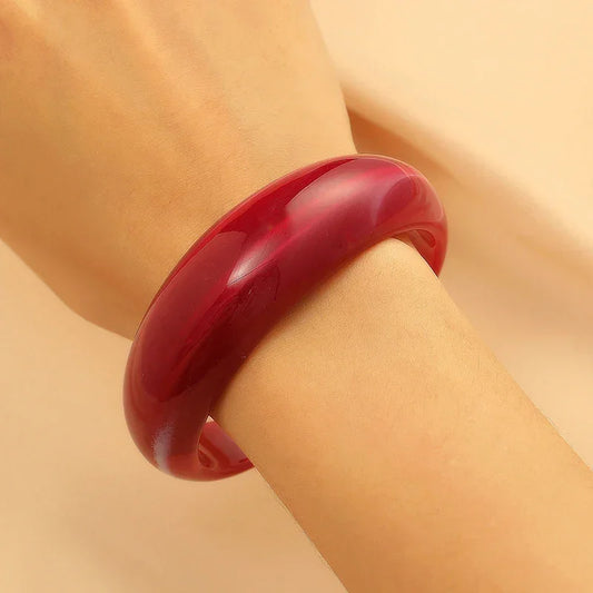 Exaggerated Jelly Colored Curved Cuff Bracelets