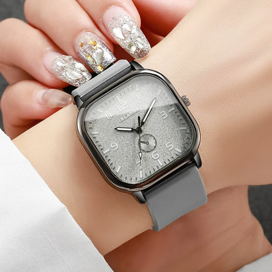 Elegant square gray wristwatch with textured dial on wrist, stylish nails, danastors fashion shop