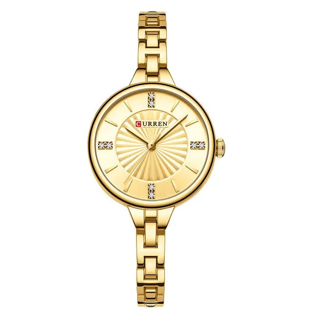 Elegant gold women’s wristwatch with crystal markers and linked bracelet design