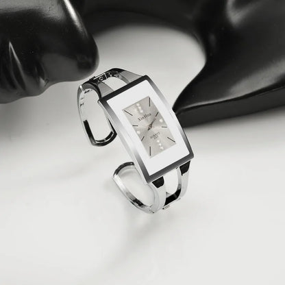 Reloj cuadrado de acero plateado con cristal de cuarzo