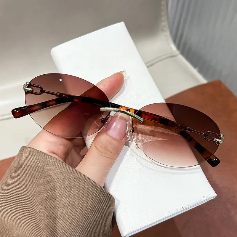 Cutting rimless small round sunglasses