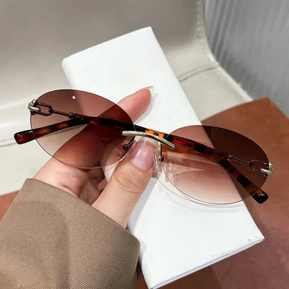 Cutting rimless small round sunglasses