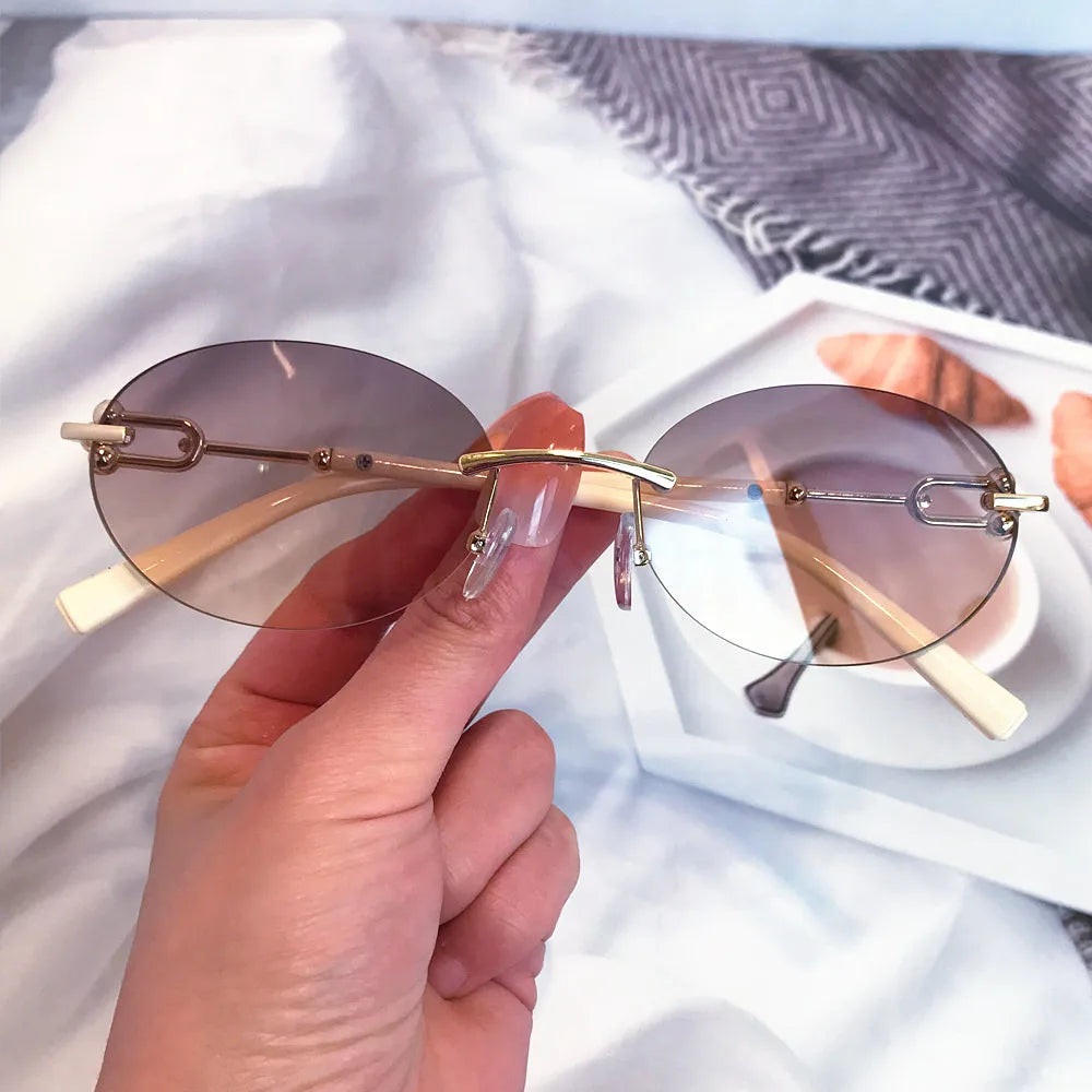 Cutting rimless small round sunglasses