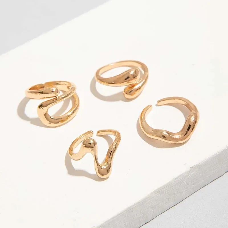 مجموعة من 4 خواتم فضية مفتوحة هندسية غير منتظمة