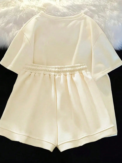 Short sleeved T-shirt paired with casual shorts Set