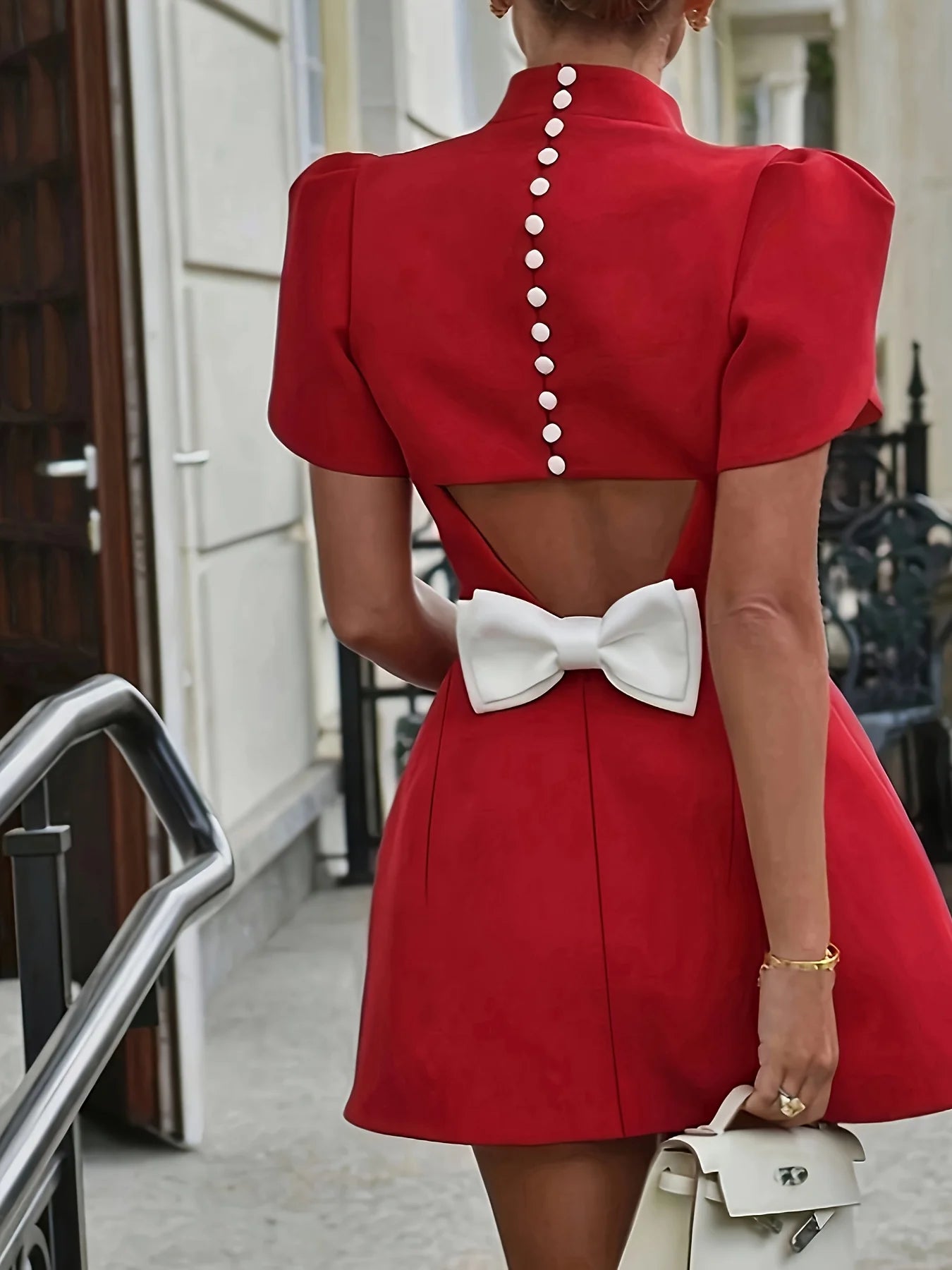 Leisure and elegant style with hollowed out bow design at the back mid dress
