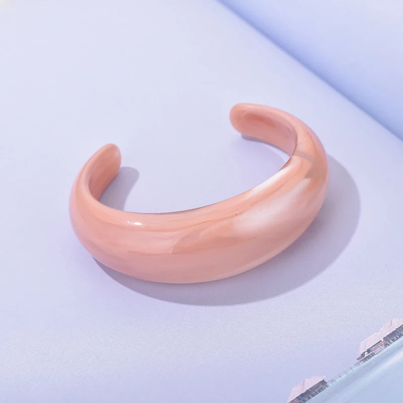 Exaggerated Jelly Colored Curved Cuff Bracelets