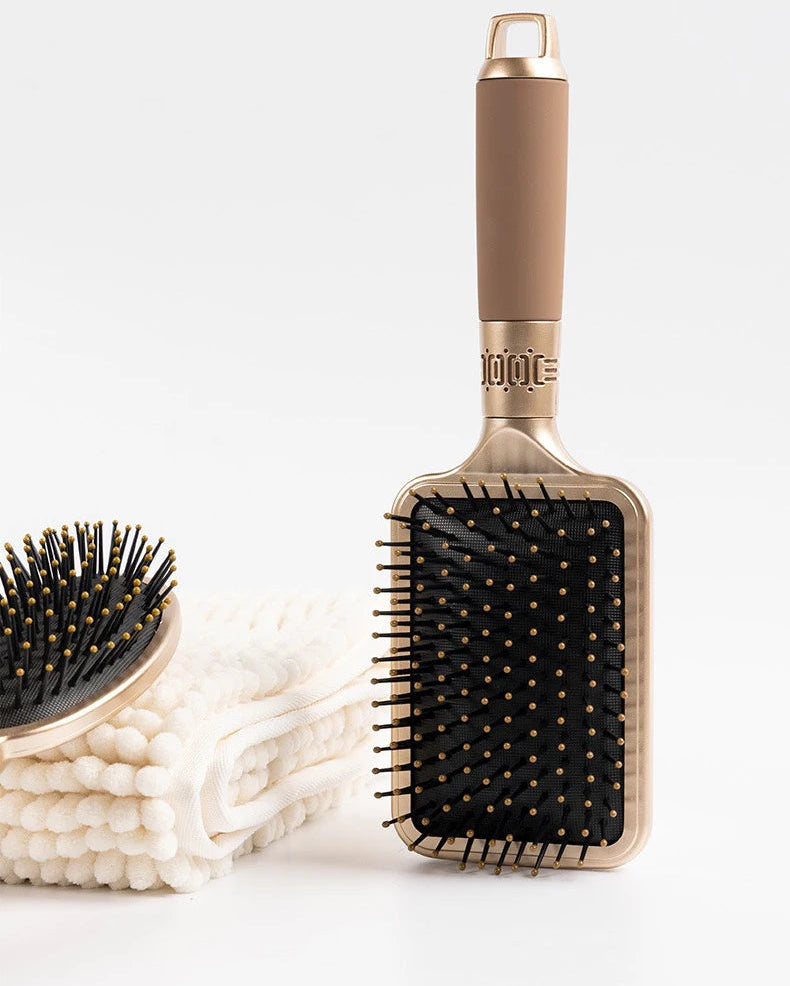 Cepillo de peine con cojín de aire para masaje