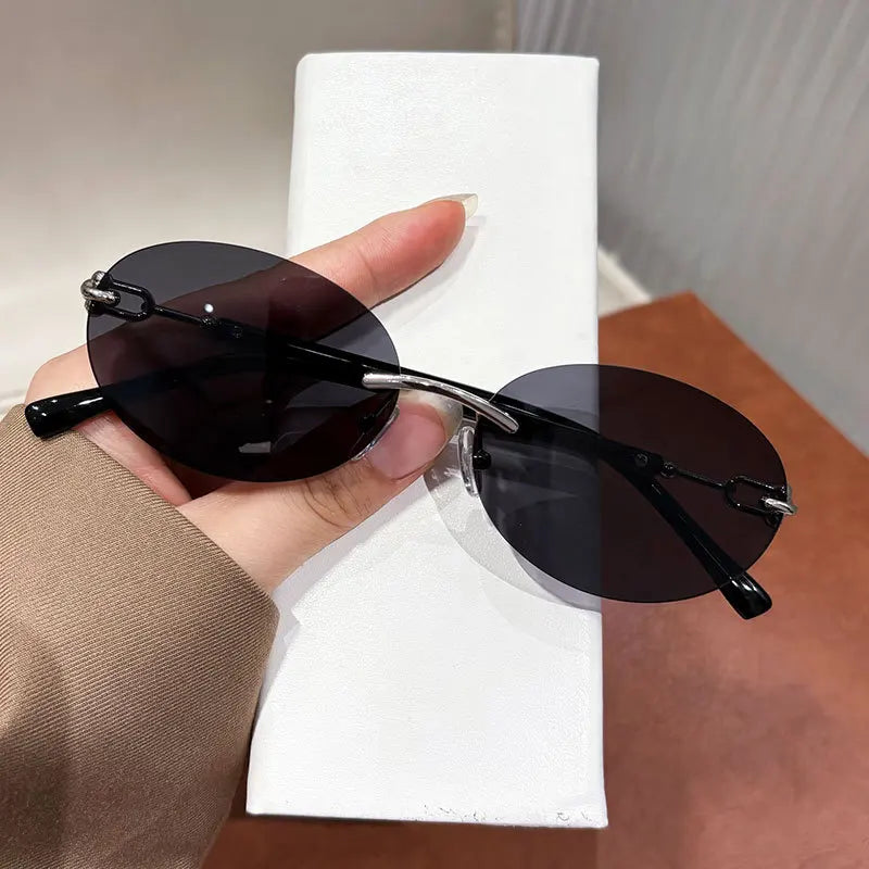 Cutting rimless small round sunglasses