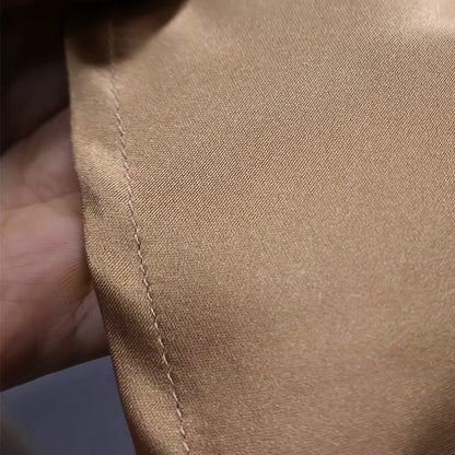 Falda midi plisada lisa de satén