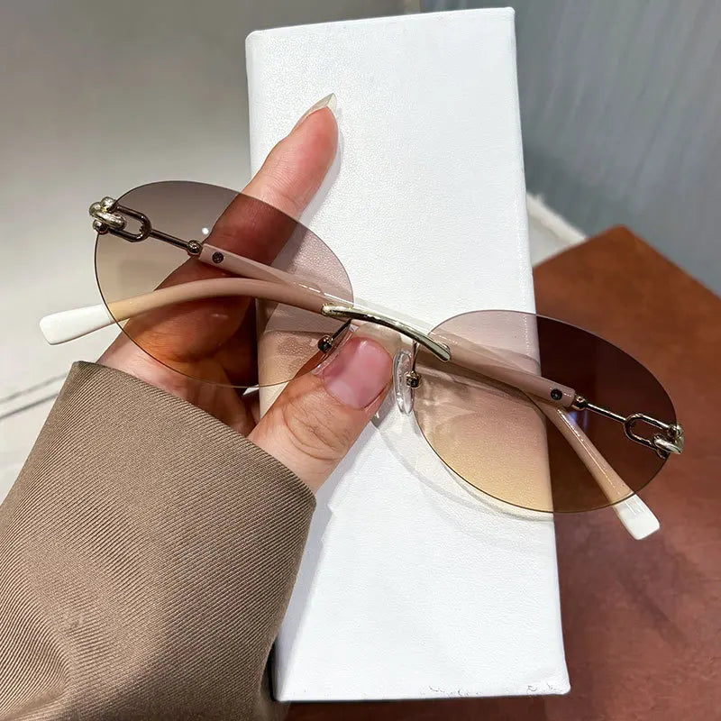 Cutting rimless small round sunglasses