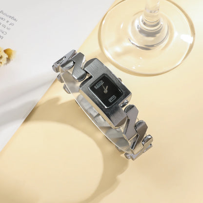 luxury mixed Arabic numeral dial quartz watch.