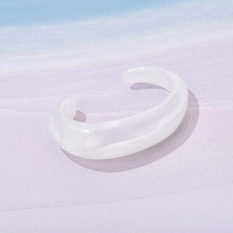 Exaggerated Jelly Colored Curved Cuff Bracelets