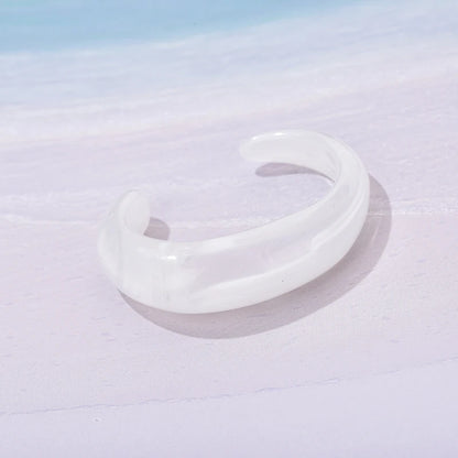 Exaggerated Jelly Colored Curved Cuff Bracelets