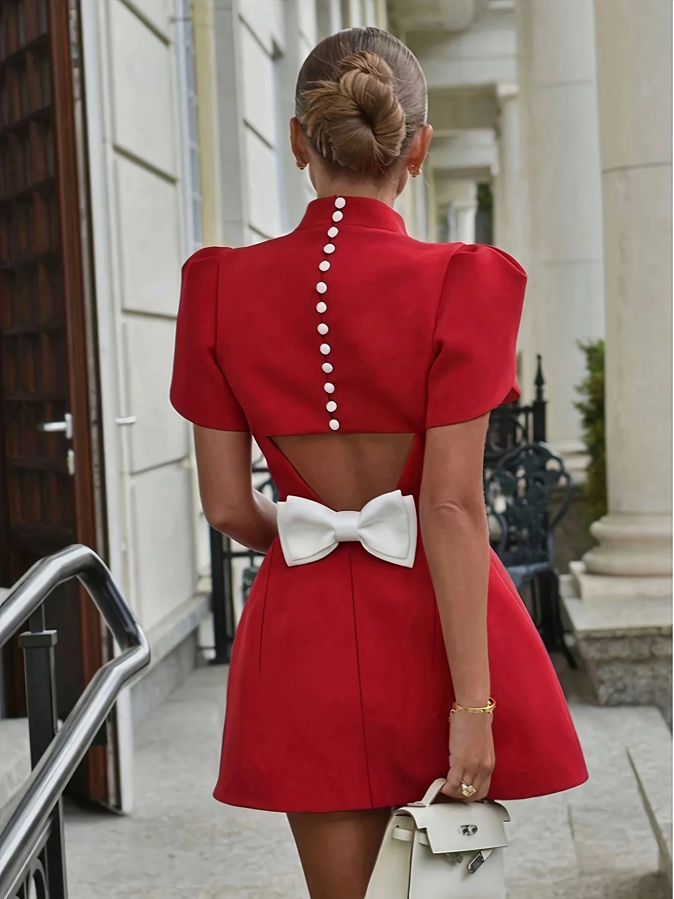 Leisure and elegant style with hollowed out bow design at the back mid dress