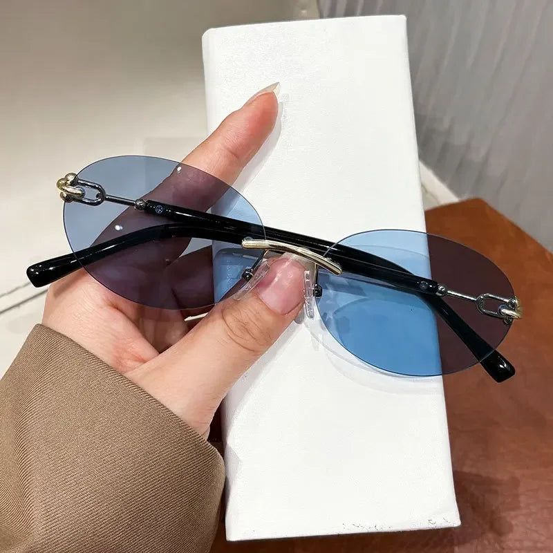 Cutting rimless small round sunglasses