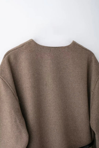 Chaqueta suave de manga larga con cuello en V y cinturón cruzado