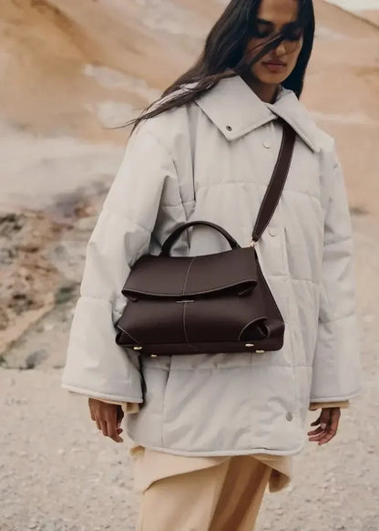 Leather pleated handbag