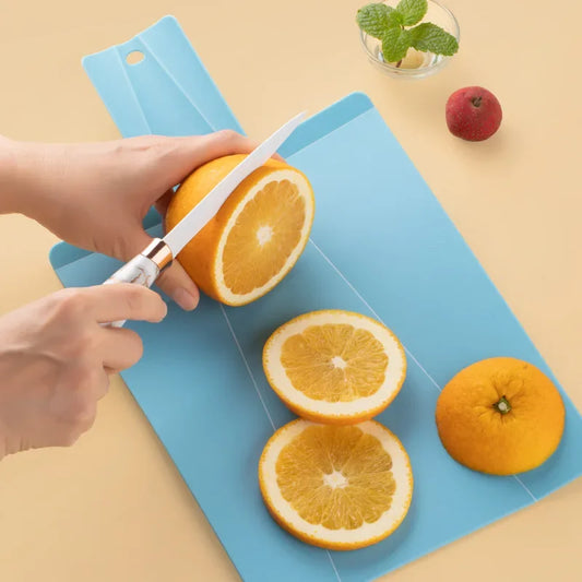 Creative foldable plastic cutting board