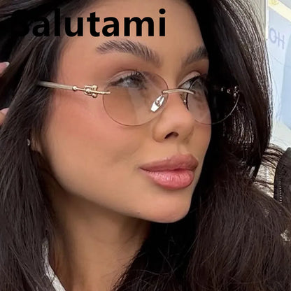 Cutting rimless small round sunglasses