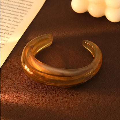 Exaggerated Jelly Colored Curved Cuff Bracelets