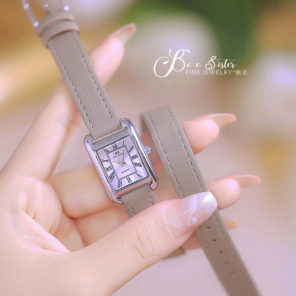 ساعة مربعة من الجلد باللون الوردي الذهبي العتيق