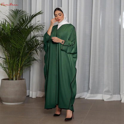 عبايات اوفر سايز بقصة الخط مع فستان بحزام