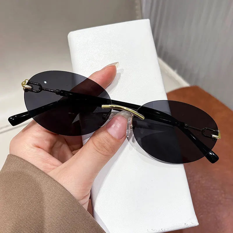Cutting rimless small round sunglasses