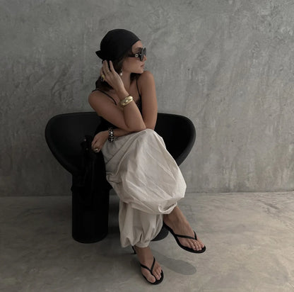 Pantalones de tiro alto y pierna ancha con bolsillos