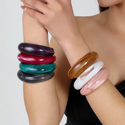 Exaggerated Jelly Colored Curved Cuff Bracelets