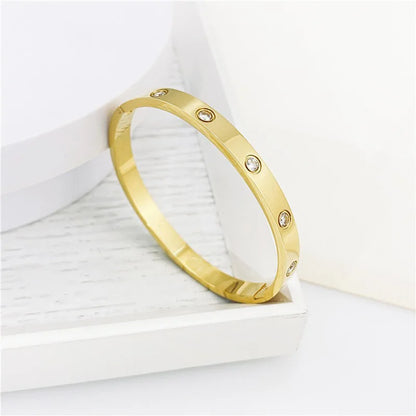 DANA Gold Zircon And Cross Nut Nail Bracelet