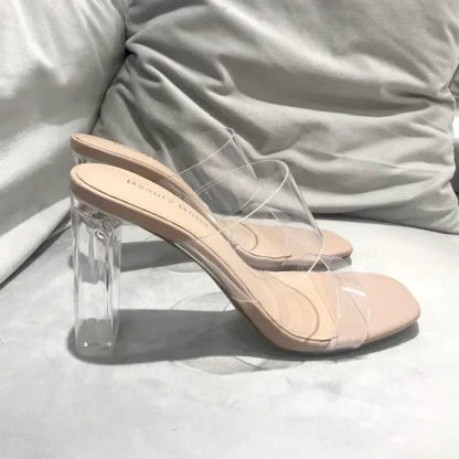 Pantuflas transparentes de tacón alto con punta abierta