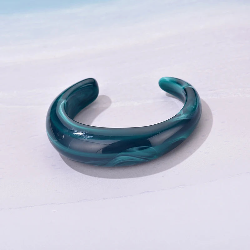 Exaggerated Jelly Colored Curved Cuff Bracelets