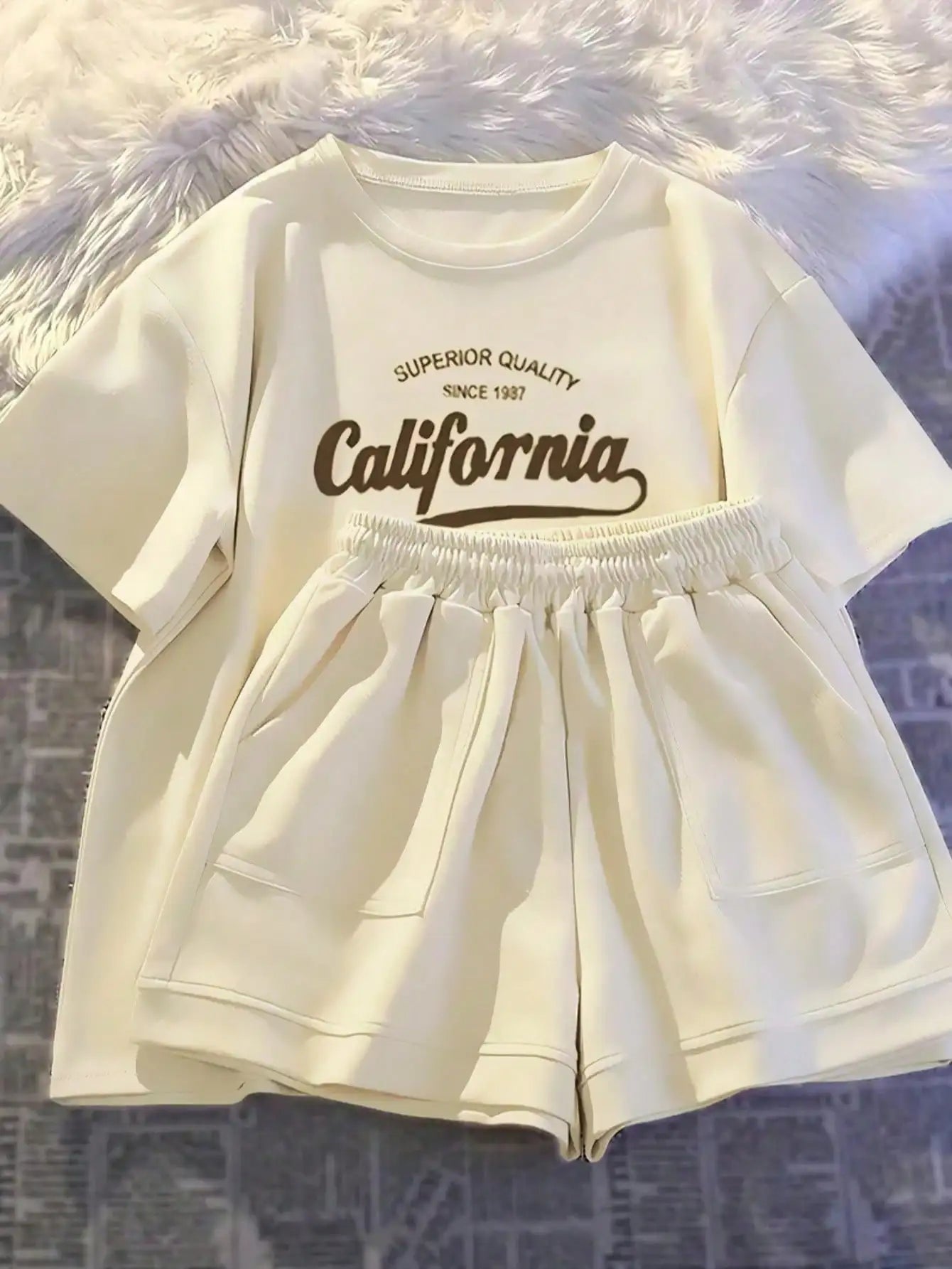 Short sleeved T-shirt paired with casual shorts Set