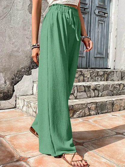 Pantalones de pierna ancha con cintura elástica alta