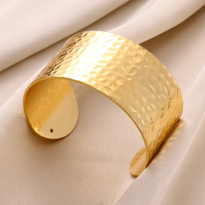Brazalete abierto DANA de acero inoxidable dorado