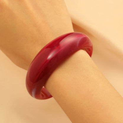 Exaggerated Jelly Colored Curved Cuff Bracelets