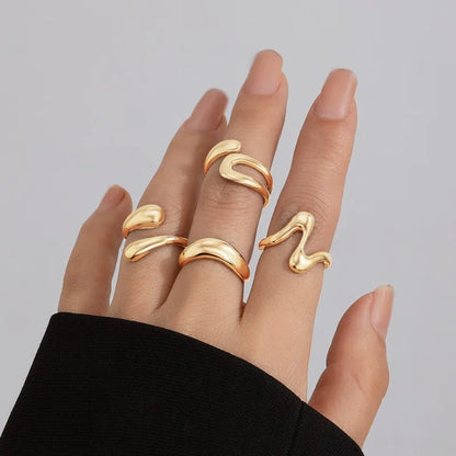 مجموعة من 4 خواتم فضية مفتوحة هندسية غير منتظمة