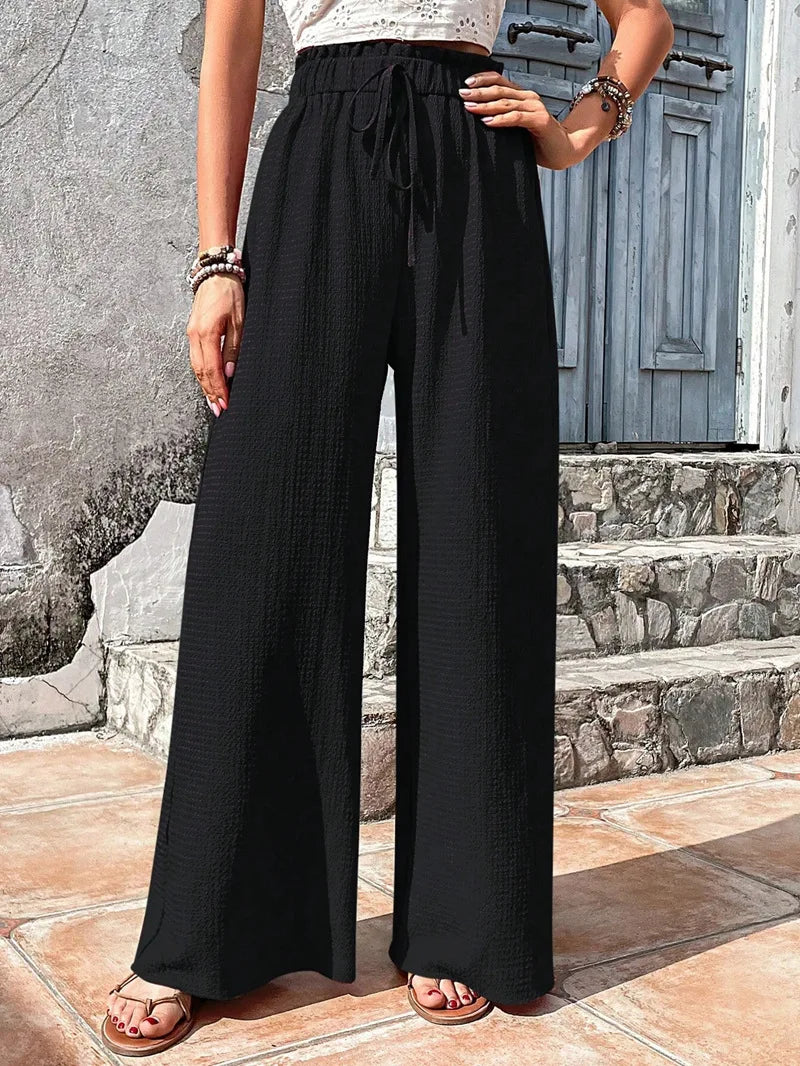Pantalones de pierna ancha con cintura elástica alta