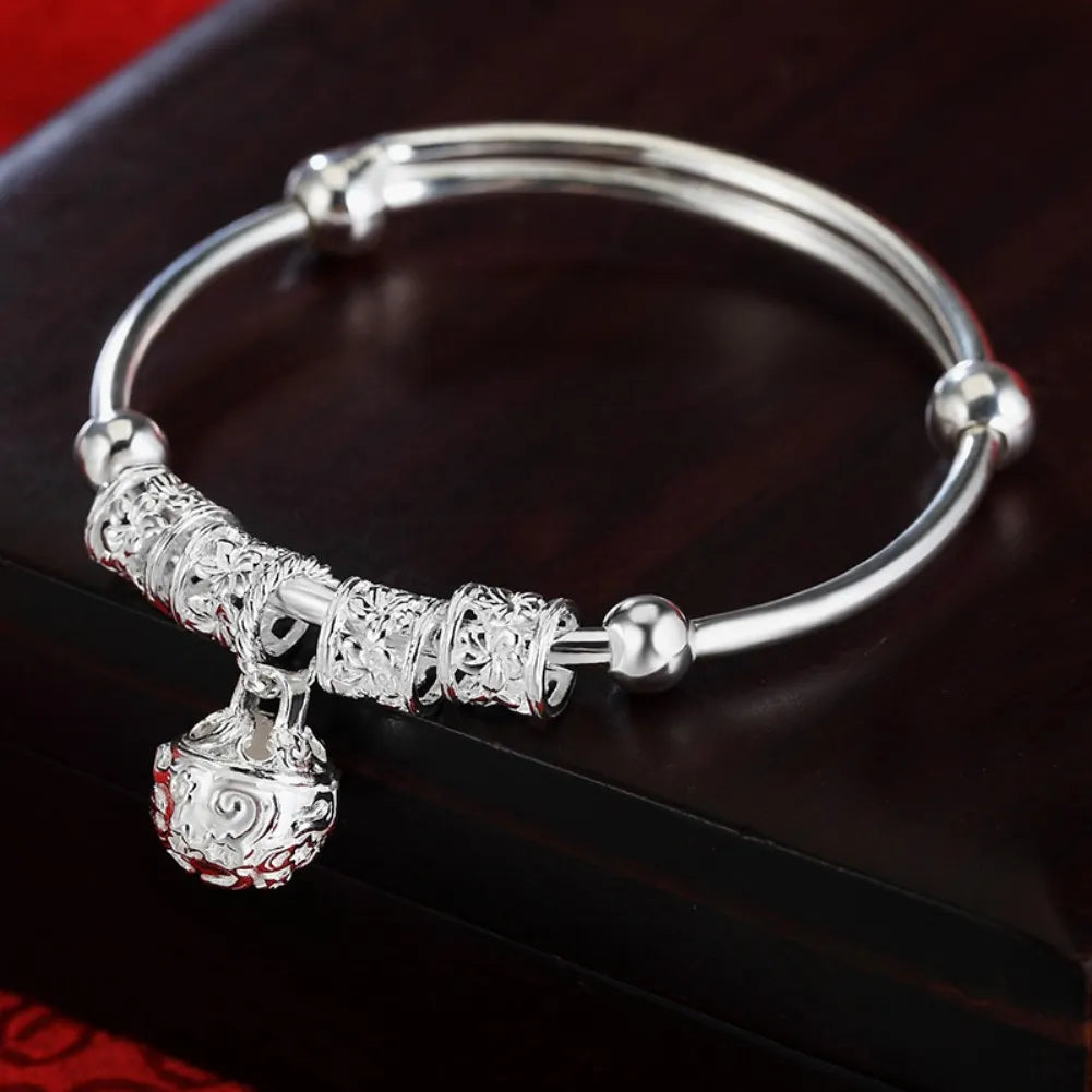 DANA Silver Hollow Bells Ball Bangles Bracelets