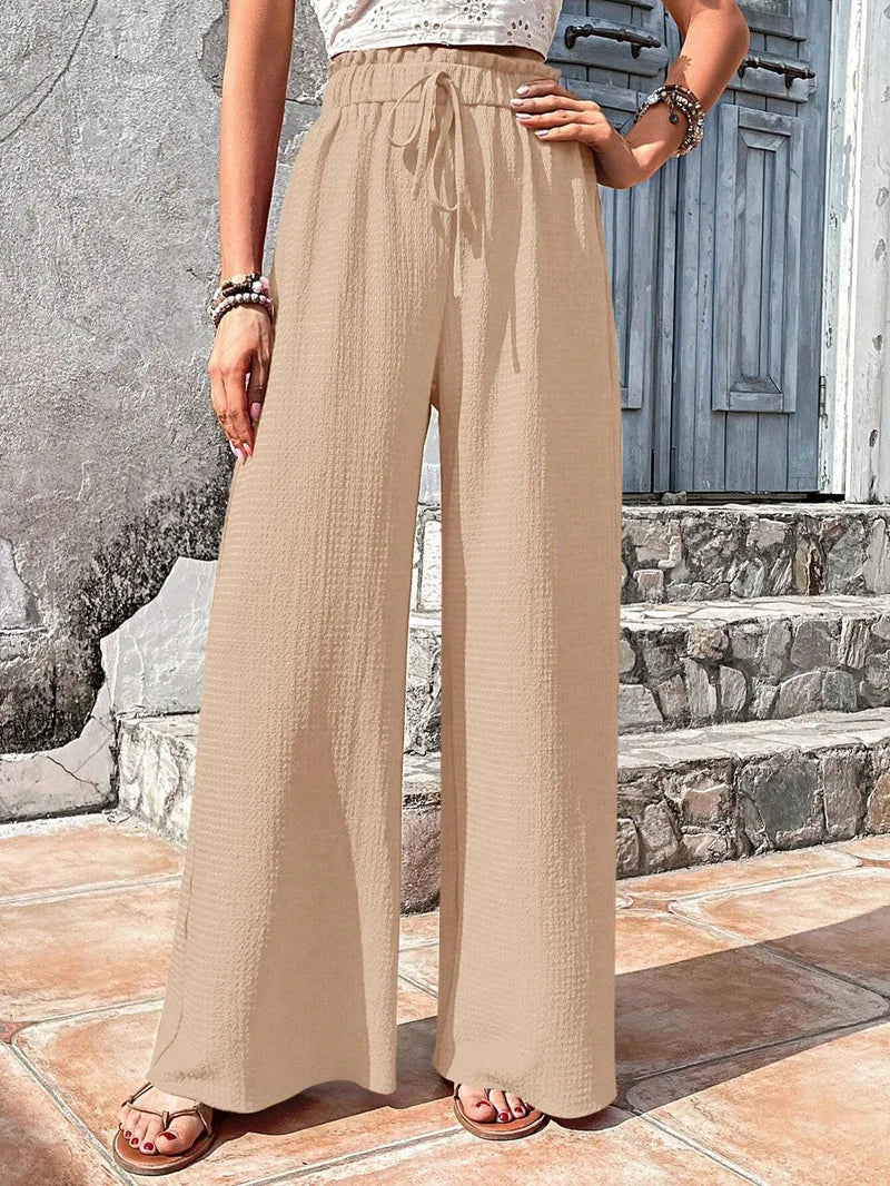 Pantalones de pierna ancha con cintura elástica alta