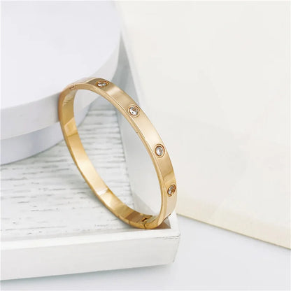 DANA Gold Zircon And Cross Nut Nail Bracelet
