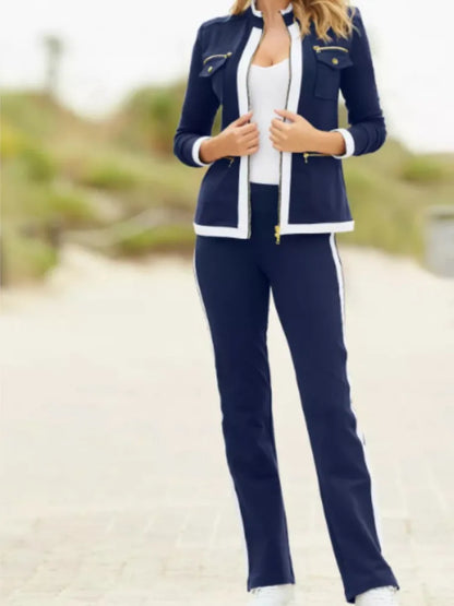 Conjunto elegante, ajustado y sencillo de pantalón deportivo recto con cremallera y top.