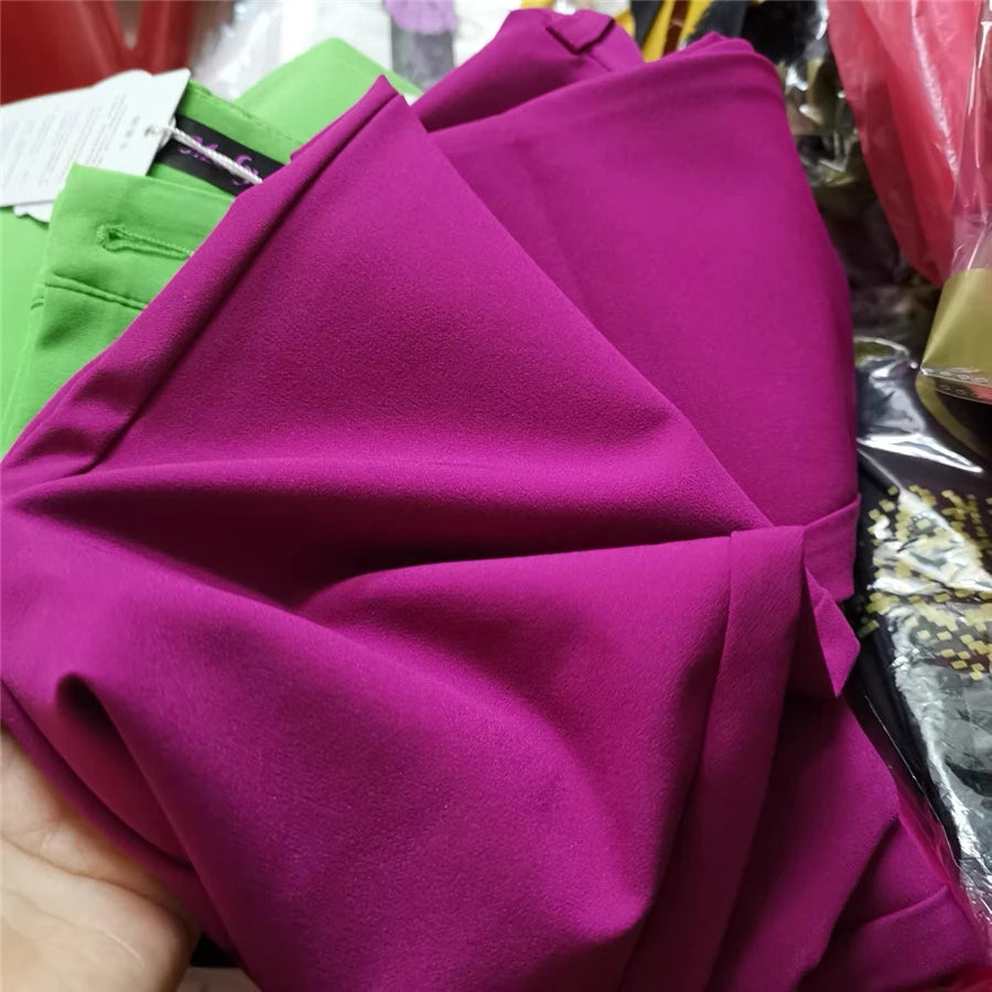 Pantalones rectos de algodón elástico de cintura ajustada