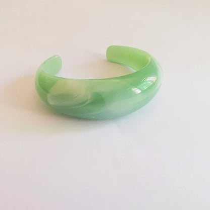 Exaggerated Jelly Colored Curved Cuff Bracelets
