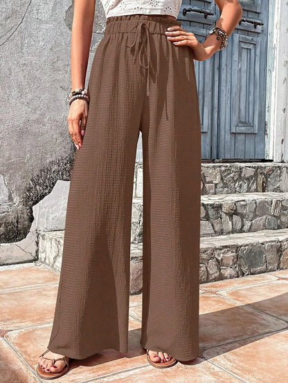 Pantalones de pierna ancha con cintura elástica alta